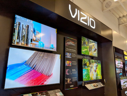 Vizio television display including multiple TVs inside of retail store.
