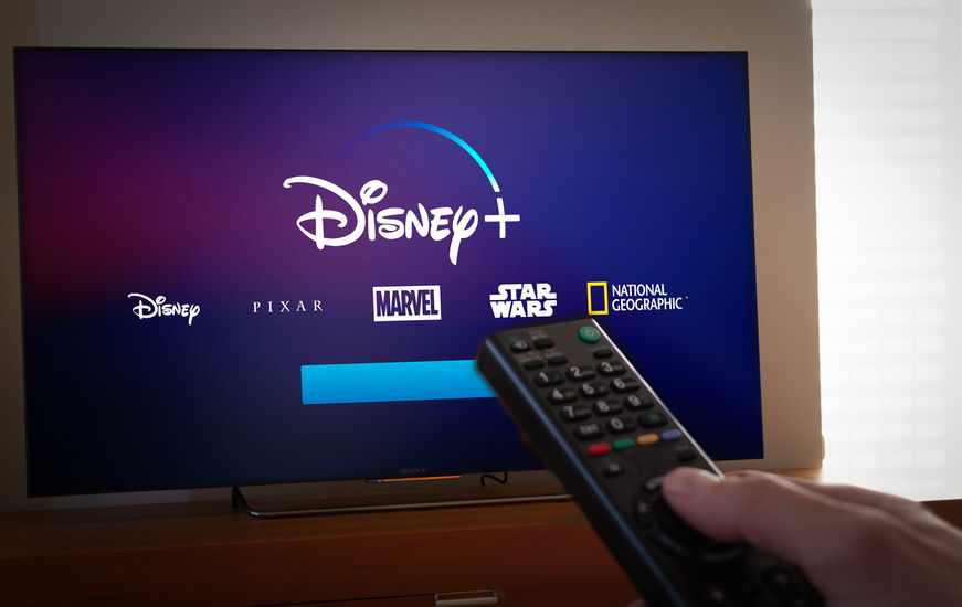 Television screen with Disney+ logo and selection of channels