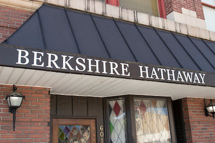 Berkshire Hathaway sign on storefront include in file name: for-editorial-use-only-berkshire-hathaway-brk-storefront