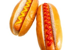 14724022 - hot dogs or wieners with mustard and ketchup toppings, the original classic take away food