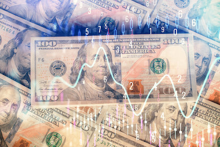 Multi exposure of abstract financial chart drawing with us dollar bills and stacks of banknotes on background.