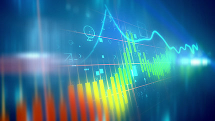 Blue background with a candlestick chart trending upwards.