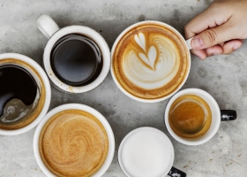 Cups of coffee from a vantage point above them.