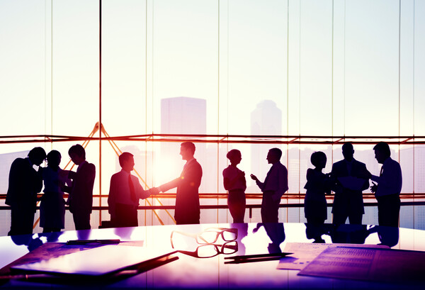 Business people meeting in corporate boardroom