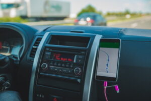 car dashboard with phone navigation. car travel