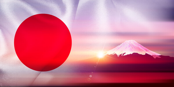 Mount Fuji sunrise against a Japanese flag