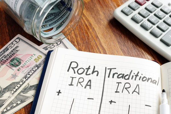 Backdoor Roth: Roth IRA and Traditional IRA written in a notebook