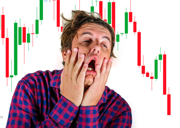 Stressed trader with downward crisis stock chart behind him
