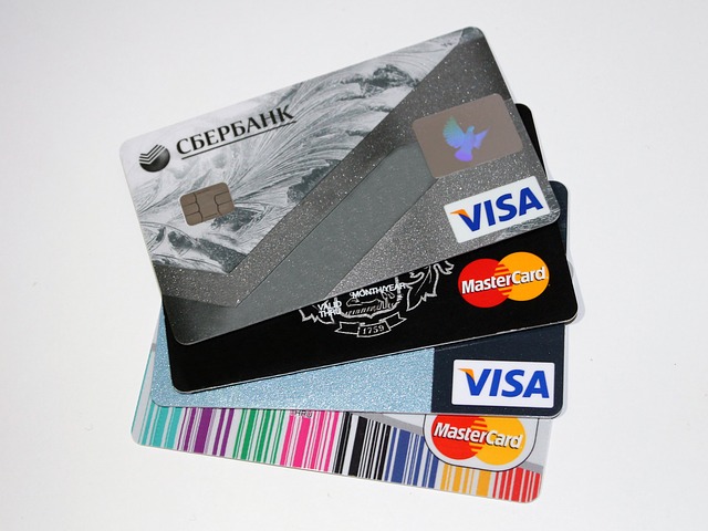 Several credit cards stacked on top of each other.