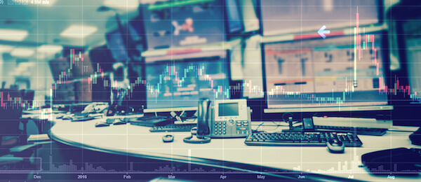 Dividend ETF: desk monitors in a stock trading room