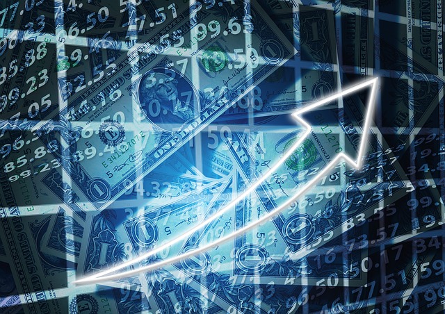 Abstract image of dollars, spreadsheets, graph gridlines, and up arrow to evoke market and business activity