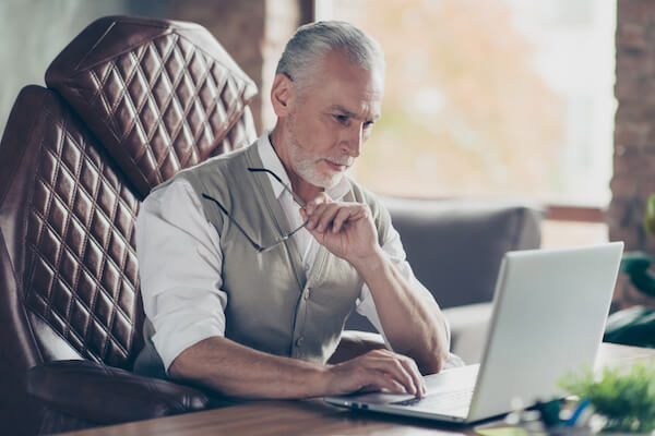 Elderly man working