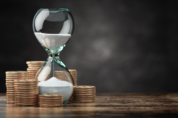 Golden coins and hourglass clock