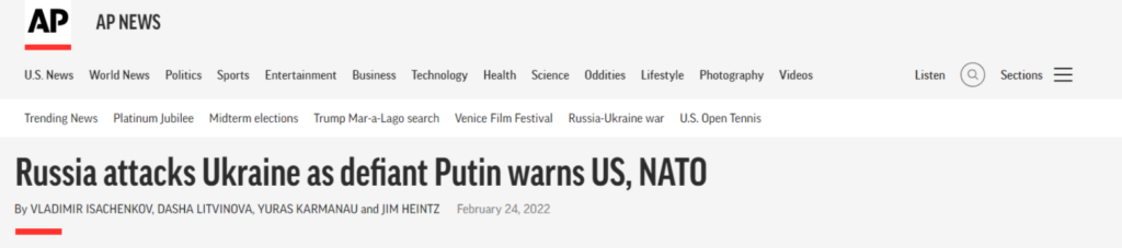 AP headline saying "Russia attacks Ukraine as defiant, Putin warns US, NATO"