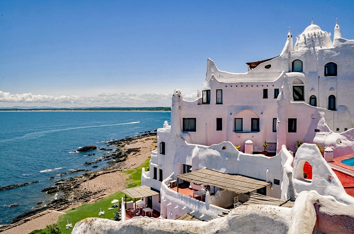 Picture of a villa on a coastline.