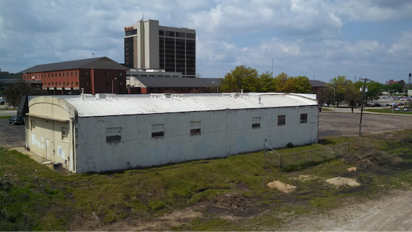 Image of a rundown warehouse.