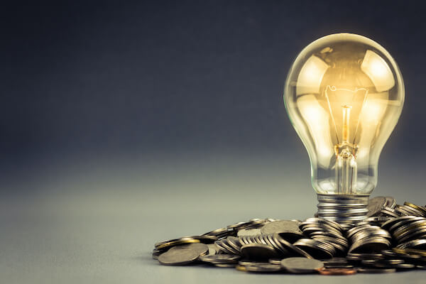 option premium: light bulb surrounded by coins