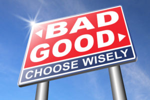 good bad a moral dilemma about values and principles right or wrong evil or honest ethics legal or illegal road sign arrow