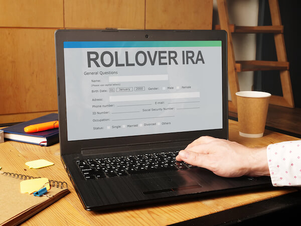 Person filling-out an online Rollover IRA form