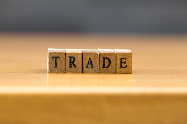 How do options work: TRADE spelled using wooden blocks