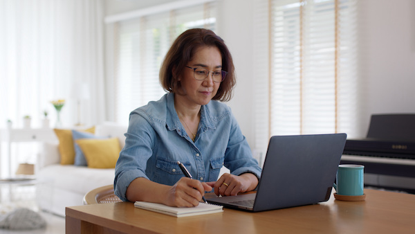 How to become an investor: woman working at home