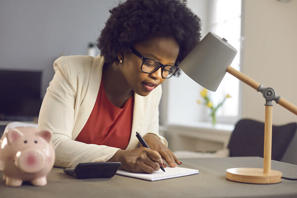 Woman writing in her notebook